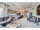 Open floor plan showcasing the kitchen, dining, and living room with recessed lighting at 16578 E 111Th Pl, Commerce City, CO 80022