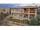 Bird's eye view of the estate, showing the patio, well-manicured backyard, and elegant architecture at 237 Maplehurst Dr, Highlands Ranch, CO 80126
