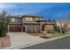 Stunning stucco home with an attached garage and stone accents, nestled on a well-manicured lot at 237 Maplehurst Dr, Highlands Ranch, CO 80126