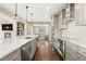 Modern kitchen with a large island, stainless steel appliances, and an open layout at 237 Maplehurst Dr, Highlands Ranch, CO 80126