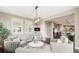 Living room featuring recessed lighting and easy access to the kitchen at 237 Maplehurst Dr, Highlands Ranch, CO 80126