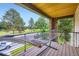 Covered porch with a hammock to enjoy the park views at 4455 Tejon St, Denver, CO 80211