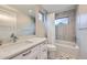 Bathroom with a shower-tub combo, window, and sleek fixtures at 4455 Tejon St, Denver, CO 80211