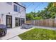 Backyard patio featuring a modern hot tub, landscaping, and outdoor lighting at 4455 Tejon St, Denver, CO 80211