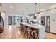 Spacious kitchen featuring a large island, stainless steel appliances, and modern cabinetry at 4455 Tejon St, Denver, CO 80211