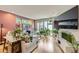Bright living room featuring stylish decor, ample natural light, and hardwood floors at 4455 Tejon St, Denver, CO 80211