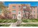 Charming vintage brick apartment building with well-maintained lawn and inviting entrance at 1410 Vine St # 3, Denver, CO 80206