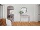 Hallway featuring an arched doorway and table, seamlessly connecting spaces with an open feel at 1410 Vine St # 3, Denver, CO 80206
