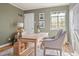 Bright home office featuring a wood desk, comfortable chair, and ample natural light at 1410 Vine St # 3, Denver, CO 80206