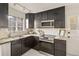 Well-equipped kitchen featuring stainless steel appliances, granite countertops, and ample cabinet space, blending style with functionality at 1410 Vine St # 3, Denver, CO 80206
