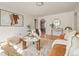 Spacious living room filled with natural light, featuring modern decor and hardwood flooring, creating an open atmosphere at 1410 Vine St # 3, Denver, CO 80206