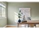 Inviting home office space with large window and natural light illuminating the desk at 1410 Vine St # 3, Denver, CO 80206
