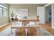 Inviting home office with a wooden desk, woven stools, and large world map, creating a productive atmosphere at 1410 Vine St # 3, Denver, CO 80206
