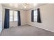Bedroom with carpet, ceiling fan, natural light, and neutral paint at 2718 S Hazel Ct, Denver, CO 80236