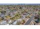Scenic aerial shot of a quiet neighborhood with mature trees and the city skyline visible in the distance at 4507 W 2Nd Ave, Denver, CO 80219