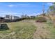 Large backyard with a wooden fence, offering privacy and ample space at 4507 W 2Nd Ave, Denver, CO 80219