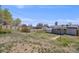 Backyard with a shed and patio, showcasing potential for outdoor living and recreation at 4507 W 2Nd Ave, Denver, CO 80219
