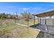 Backyard with a shed, covered patio, and potential for landscaping at 4507 W 2Nd Ave, Denver, CO 80219