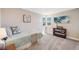 Cozy bedroom with a comfortable bed and a decorative wave painting at 4507 W 2Nd Ave, Denver, CO 80219