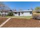 A quaint single story home with well-kept lawn, featuring a welcoming entryway at 4507 W 2Nd Ave, Denver, CO 80219