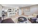 Spacious, open-concept kitchen flowing into the living area, complete with stainless steel appliances and modern finishes at 4507 W 2Nd Ave, Denver, CO 80219
