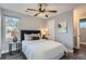 Cozy bedroom with stylish decor, soft lighting, and a comfortable bed creating a tranquil retreat at 11885 W Katherine Ave, Lakewood, CO 80401