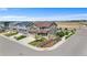 Beautiful home on a corner lot in a suburban neighborhood with construction in the distance at 15100 Gaylord St, Thornton, CO 80602