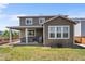 Spacious backyard with a covered patio, perfect for outdoor entertaining at 15100 Gaylord St, Thornton, CO 80602