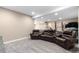 Basement featuring a home theater area with comfortable reclining chairs for entertainment at 15100 Gaylord St, Thornton, CO 80602