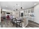Spacious kitchen with a large island, stainless steel appliances, and an open layout to the living room at 15100 Gaylord St, Thornton, CO 80602