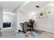 Finished basement area featuring a dedicated office space and neutral decor at 6537 S Brentwood Way, Littleton, CO 80123
