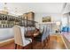 Dining room with hardwood floors, fireplace and elegant furnishings for refined meals and gatherings at 6537 S Brentwood Way, Littleton, CO 80123