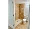 Bathroom features tiled stand-up shower and a sleek toilet with updated fixtures at 912 S Dearborn Way # 3, Aurora, CO 80012