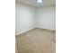 Carpeted room with neutral tones, offering a blank canvas for personalization at 912 S Dearborn Way # 3, Aurora, CO 80012