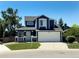 Charming two-story home with a well-manicured lawn and a two-car garage, perfect for Gathering living at 16840 Hoot Owl Ct, Parker, CO 80134