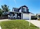 Charming two-story home with a well-manicured lawn and a two-car garage, perfect for Gathering living at 16840 Hoot Owl Ct, Parker, CO 80134