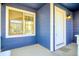 Charming covered front porch with cozy decor, perfect for enjoying the outdoors at 16840 Hoot Owl Ct, Parker, CO 80134