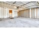 Unfinished two car garage featuring ample space for parking and storage at 16840 Hoot Owl Ct, Parker, CO 80134