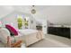 Bedroom featuring a large window, carpeted floor, and a dedicated workspace area at 3363 W 32Nd Ave, Denver, CO 80211