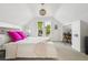 Bright bedroom featuring a large window, cozy decor, and a dedicated workspace area at 3363 W 32Nd Ave, Denver, CO 80211