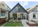 Inviting exterior showcasing manicured lawn and charming facade with modern design elements at 3363 W 32Nd Ave, Denver, CO 80211
