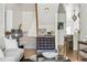 Open living space that flows to stairs and kitchen with stylish modern decor at 3363 W 32Nd Ave, Denver, CO 80211