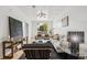 Well-lit living room with stylish furniture, modern lighting, and an open layout at 3363 W 32Nd Ave, Denver, CO 80211