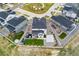 Aerial view of a two-story house showcasing the backyard and the play area at 7137 S Vandriver Way, Aurora, CO 80016