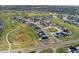 An aerial view of the home in a residential neighborhood and park at 7137 S Vandriver Way, Aurora, CO 80016