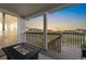 Covered deck featuring a firepit, a great view and a seating area at 7137 S Vandriver Way, Aurora, CO 80016