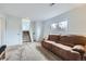 Spacious basement featuring neutral carpet, and a comfortable sofa at 11121 W 107Th Pl, Westminster, CO 80021