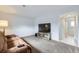 Cozy living room with a plush couch and entertainment center, great for relaxing at 11121 W 107Th Pl, Westminster, CO 80021