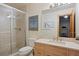 Bathroom featuring a glass shower, modern sink, and access to the exercise room at 786 International Isle Dr, Castle Rock, CO 80108