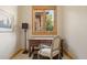 Cozy office nook with a classic wooden desk, comfortable chair, and a bright window view at 786 International Isle Dr, Castle Rock, CO 80108